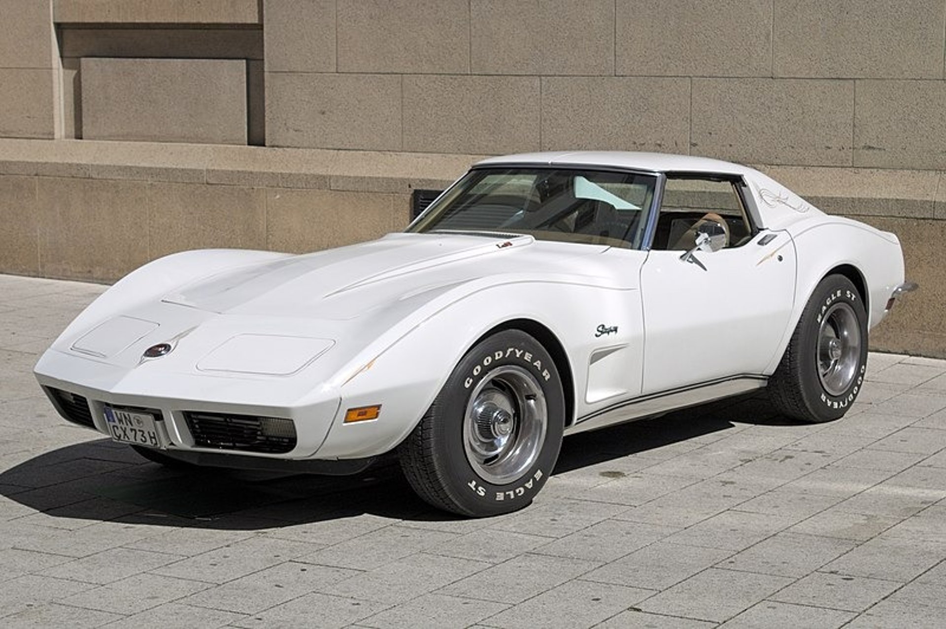 White vintage Chevrolet Corvette representing classic-car winter storage near Lake Geneva
